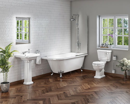 Classic white bathroom with a wooden herringbone flooring